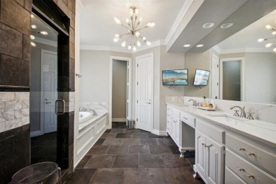 Welcome to a refined residence nestled on the prestigious west on Oak Tree National Golf and Country Club in Oklahoma - for sale on GolfHomes.com, golf home, golf lot