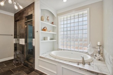 Welcome to a refined residence nestled on the prestigious west on Oak Tree National Golf and Country Club in Oklahoma - for sale on GolfHomes.com, golf home, golf lot
