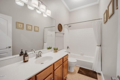 Discover timeless elegance in this immaculately maintained on TPC at Wakefield Plantation in North Carolina - for sale on GolfHomes.com, golf home, golf lot