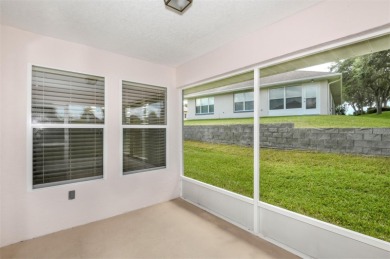 This well-maintained 2 bedroom/2 bathroom/den/2 car garage home on Twisted Oaks Golf Club in Florida - for sale on GolfHomes.com, golf home, golf lot