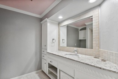 Welcome to a refined residence nestled on the prestigious west on Oak Tree National Golf and Country Club in Oklahoma - for sale on GolfHomes.com, golf home, golf lot