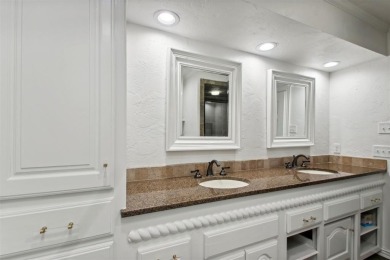 Welcome to a refined residence nestled on the prestigious west on Oak Tree National Golf and Country Club in Oklahoma - for sale on GolfHomes.com, golf home, golf lot