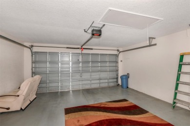 This well-maintained 2 bedroom/2 bathroom/den/2 car garage home on Twisted Oaks Golf Club in Florida - for sale on GolfHomes.com, golf home, golf lot