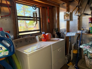 This lovely, manufactured home is on leased land in Lake on Pine Lakes Country Club in Florida - for sale on GolfHomes.com, golf home, golf lot