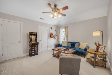Discover timeless elegance in this immaculately maintained on TPC at Wakefield Plantation in North Carolina - for sale on GolfHomes.com, golf home, golf lot