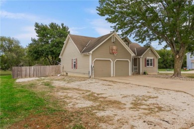 Welcome to this stunning 4-bedroom (1NC), 2.5 bath home sitting on Gardner Golf Course in Kansas - for sale on GolfHomes.com, golf home, golf lot