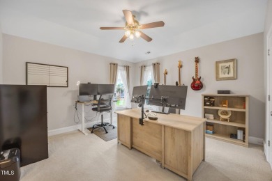Discover timeless elegance in this immaculately maintained on TPC at Wakefield Plantation in North Carolina - for sale on GolfHomes.com, golf home, golf lot