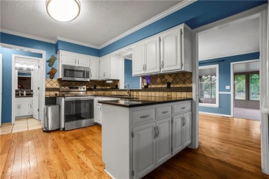 Welcome to this stunning 4-bedroom (1NC), 2.5 bath home sitting on Gardner Golf Course in Kansas - for sale on GolfHomes.com, golf home, golf lot