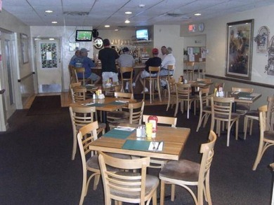 This lovely, manufactured home is on leased land in Lake on Pine Lakes Country Club in Florida - for sale on GolfHomes.com, golf home, golf lot