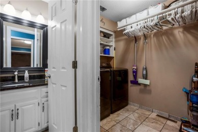Welcome to this stunning 4-bedroom (1NC), 2.5 bath home sitting on Gardner Golf Course in Kansas - for sale on GolfHomes.com, golf home, golf lot