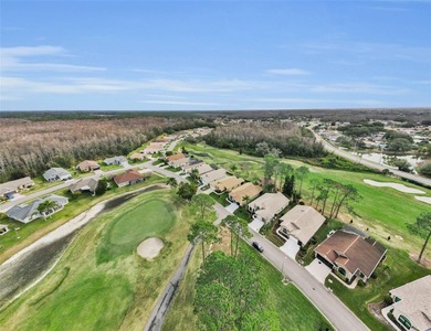 IN TIMBER GREENS A 55+ GATED GOLF COMMUNITY....This Beautiful on Timber Greens Country Club in Florida - for sale on GolfHomes.com, golf home, golf lot