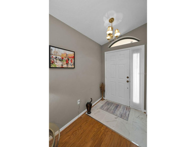 IN TIMBER GREENS A 55+ GATED GOLF COMMUNITY....This Beautiful on Timber Greens Country Club in Florida - for sale on GolfHomes.com, golf home, golf lot