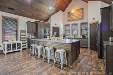 This stunning mountain farmhouse blends rustic charm with modern on Upland Trace Golf Course in North Carolina - for sale on GolfHomes.com, golf home, golf lot