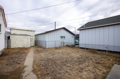 Built in 1906, this charming turn of the century home on E Front on The Old Works Golf Course in Montana - for sale on GolfHomes.com, golf home, golf lot