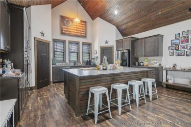 This stunning mountain farmhouse blends rustic charm with modern on Upland Trace Golf Course in North Carolina - for sale on GolfHomes.com, golf home, golf lot