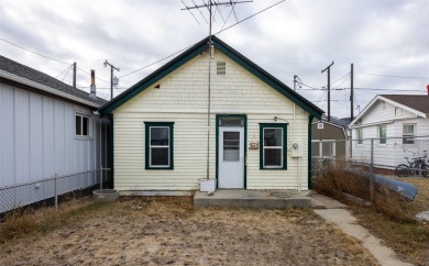 Built in 1906, this charming turn of the century home on E Front on The Old Works Golf Course in Montana - for sale on GolfHomes.com, golf home, golf lot