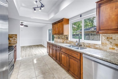 One or more photo(s) has been virtually staged. This charming on Northdale Golf and Tennis Club in Florida - for sale on GolfHomes.com, golf home, golf lot