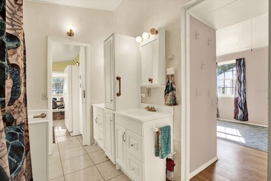 Discover the charm of Camp-A-Wyle, a highly desirable community on Glen Lakes Country Club in Florida - for sale on GolfHomes.com, golf home, golf lot