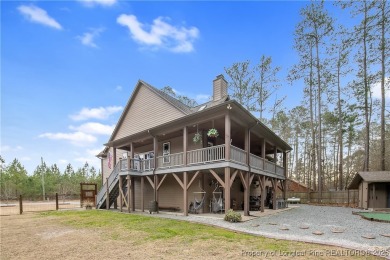 This stunning mountain farmhouse blends rustic charm with modern on Upland Trace Golf Course in North Carolina - for sale on GolfHomes.com, golf home, golf lot