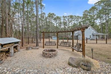 This stunning mountain farmhouse blends rustic charm with modern on Upland Trace Golf Course in North Carolina - for sale on GolfHomes.com, golf home, golf lot