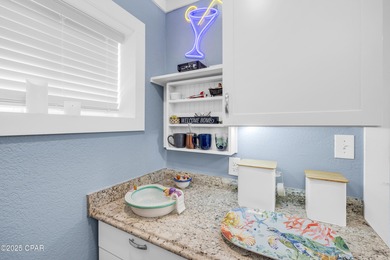 UPDATED. GOLF NEXT DOOR. MINUTES TO THE BEACH. This 2-bed on Holiday Golf Club in Florida - for sale on GolfHomes.com, golf home, golf lot