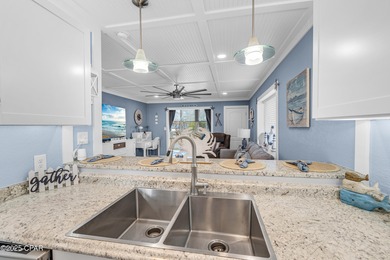 UPDATED. GOLF NEXT DOOR. MINUTES TO THE BEACH. This 2-bed on Holiday Golf Club in Florida - for sale on GolfHomes.com, golf home, golf lot