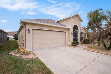 Welcome to this stunning home in the 55+ community of Tampa Bay on Tampa Bay Golf and Country Club in Florida - for sale on GolfHomes.com, golf home, golf lot