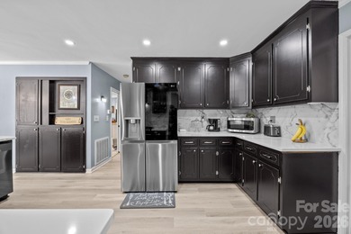 Nestled in the desirable Salisbury Country Club community, this on Country Club of Salisbury in North Carolina - for sale on GolfHomes.com, golf home, golf lot