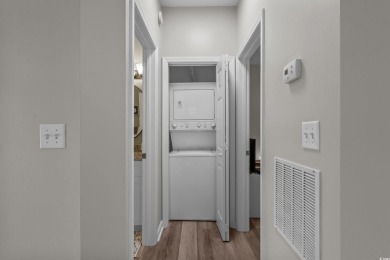 This completely renovated 2-bedroom, 2-bathroom first-floor on River Oaks Golf Plantation  in South Carolina - for sale on GolfHomes.com, golf home, golf lot