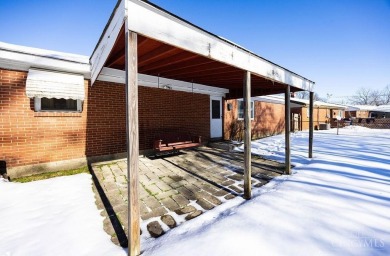 Well maintained brick ranch full of potential, fully fenced in on Meadow Links and Golf Academy in Ohio - for sale on GolfHomes.com, golf home, golf lot