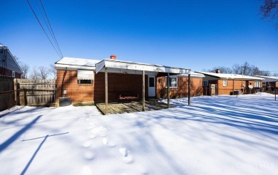 Well maintained brick ranch full of potential, fully fenced in on Meadow Links and Golf Academy in Ohio - for sale on GolfHomes.com, golf home, golf lot