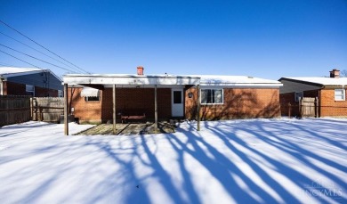 Well maintained brick ranch full of potential, fully fenced in on Meadow Links and Golf Academy in Ohio - for sale on GolfHomes.com, golf home, golf lot