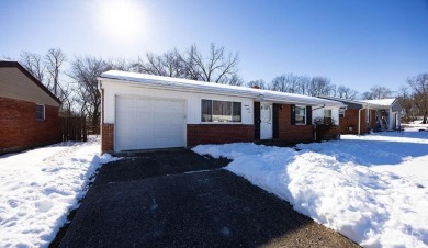 Well maintained brick ranch full of potential, fully fenced in on Meadow Links and Golf Academy in Ohio - for sale on GolfHomes.com, golf home, golf lot