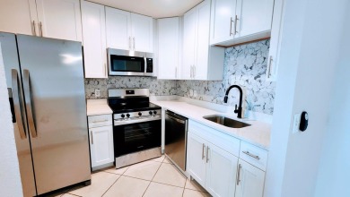 Welcome to your dream condo in the highly sought-after Kings on Kings Point Golf -Flanders Way in Florida - for sale on GolfHomes.com, golf home, golf lot