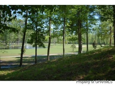 Build your dream house on this beautiful, hilly lot overlooking on Ironwood Golf and Country Club in North Carolina - for sale on GolfHomes.com, golf home, golf lot