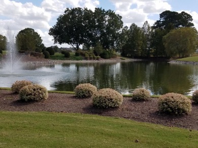 Build your dream house on this beautiful, hilly lot overlooking on Ironwood Golf and Country Club in North Carolina - for sale on GolfHomes.com, golf home, golf lot