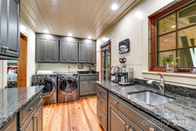 Perched at 4,600' along the ridgeline, this classic rustic home on Balsam Mountain Preserve in North Carolina - for sale on GolfHomes.com, golf home, golf lot