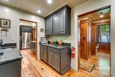 Perched at 4,600' along the ridgeline, this classic rustic home on Balsam Mountain Preserve in North Carolina - for sale on GolfHomes.com, golf home, golf lot