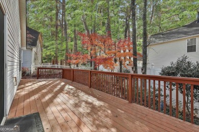 THIS STUNNING OPEN RANCH PLAN IS CONVENIENTLY LOCATED IN NORTH on Canongate At Flat Creek Club in Georgia - for sale on GolfHomes.com, golf home, golf lot