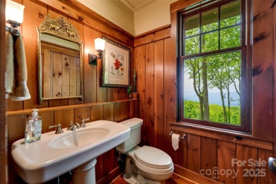 Perched at 4,600' along the ridgeline, this classic rustic home on Balsam Mountain Preserve in North Carolina - for sale on GolfHomes.com, golf home, golf lot