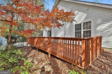 THIS STUNNING OPEN RANCH PLAN IS CONVENIENTLY LOCATED IN NORTH on Canongate At Flat Creek Club in Georgia - for sale on GolfHomes.com, golf home, golf lot