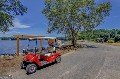 THIS STUNNING OPEN RANCH PLAN IS CONVENIENTLY LOCATED IN NORTH on Canongate At Flat Creek Club in Georgia - for sale on GolfHomes.com, golf home, golf lot