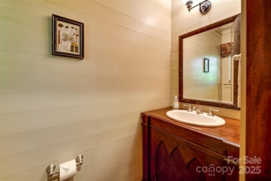 Perched at 4,600' along the ridgeline, this classic rustic home on Balsam Mountain Preserve in North Carolina - for sale on GolfHomes.com, golf home, golf lot