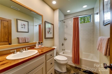 Perched at 4,600' along the ridgeline, this classic rustic home on Balsam Mountain Preserve in North Carolina - for sale on GolfHomes.com, golf home, golf lot