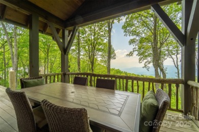 Perched at 4,600' along the ridgeline, this classic rustic home on Balsam Mountain Preserve in North Carolina - for sale on GolfHomes.com, golf home, golf lot