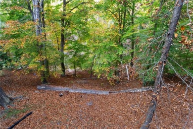 End unit on wooded lot with views of Kingsmill Pond. Sun room on Kingsmill Resort and Golf Club in Virginia - for sale on GolfHomes.com, golf home, golf lot