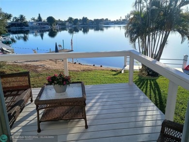 Direct waterfront manufactured home (2005) offering panoramic on The Club at Emerald Hills in Florida - for sale on GolfHomes.com, golf home, golf lot