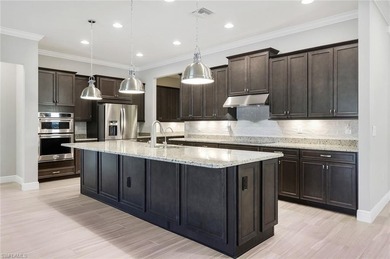 Welcome to 3837 Helmsman Drive--a 4 bedroom + den, 3-car garage on Vanderbilt Country Club in Florida - for sale on GolfHomes.com, golf home, golf lot