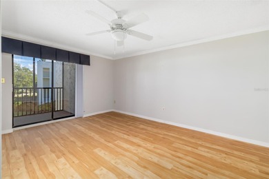 Step inside this beautifully remodeled 3rd-floor, 2-bedroom on IMG Academies Golf and Country Club in Florida - for sale on GolfHomes.com, golf home, golf lot