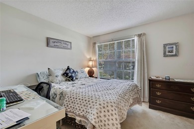 Beautifully maintained 2-bedroom, 2-bath villa featuring tile on Timber Pines Golf Course in Florida - for sale on GolfHomes.com, golf home, golf lot